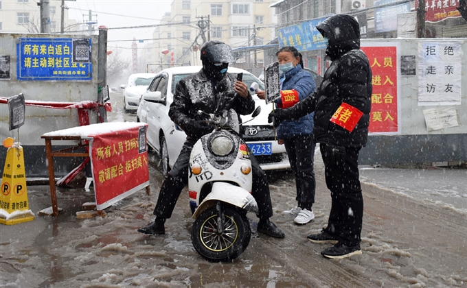 攝影：風雪中的堅守